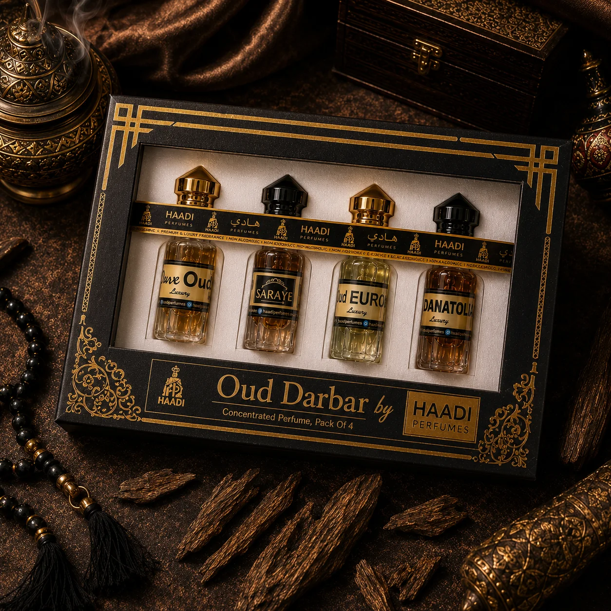 Haadi Oud Darbar perfume oil gift set, in a dark luxury setting