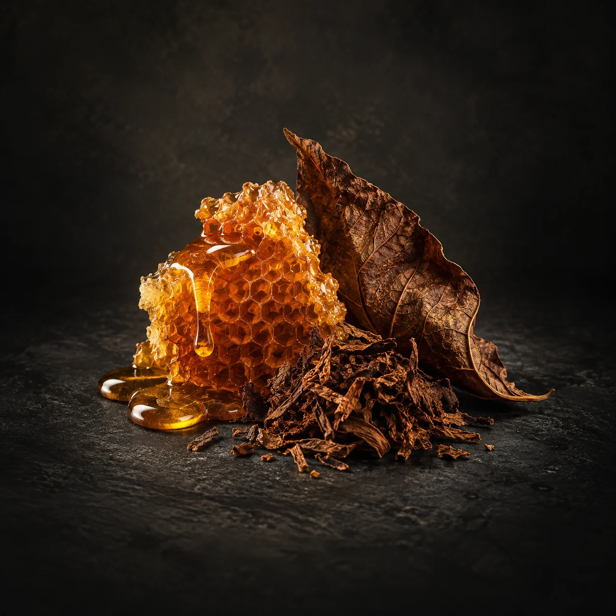 Heart fragrance notes for Haadi Den Noir: Rich honey and tobacco